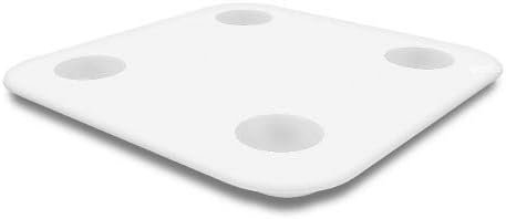 Balança inteligente branca com quatro sensores circulares na superfície